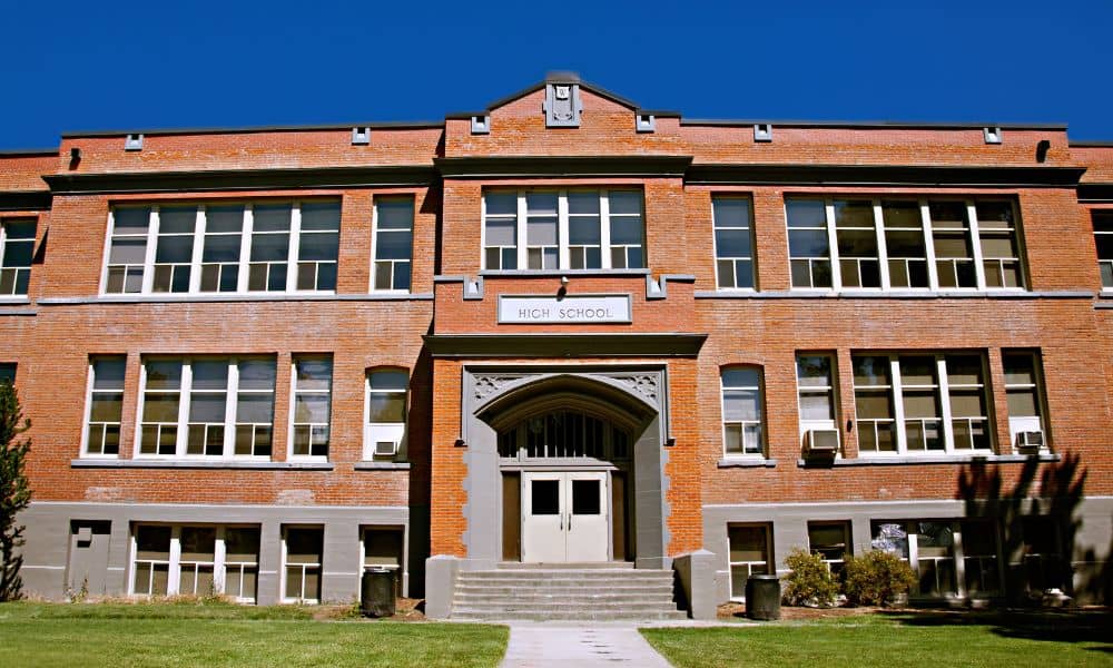 School building constructed with exposed brick masonry, showcasing structural durability and aesthetic brick design.