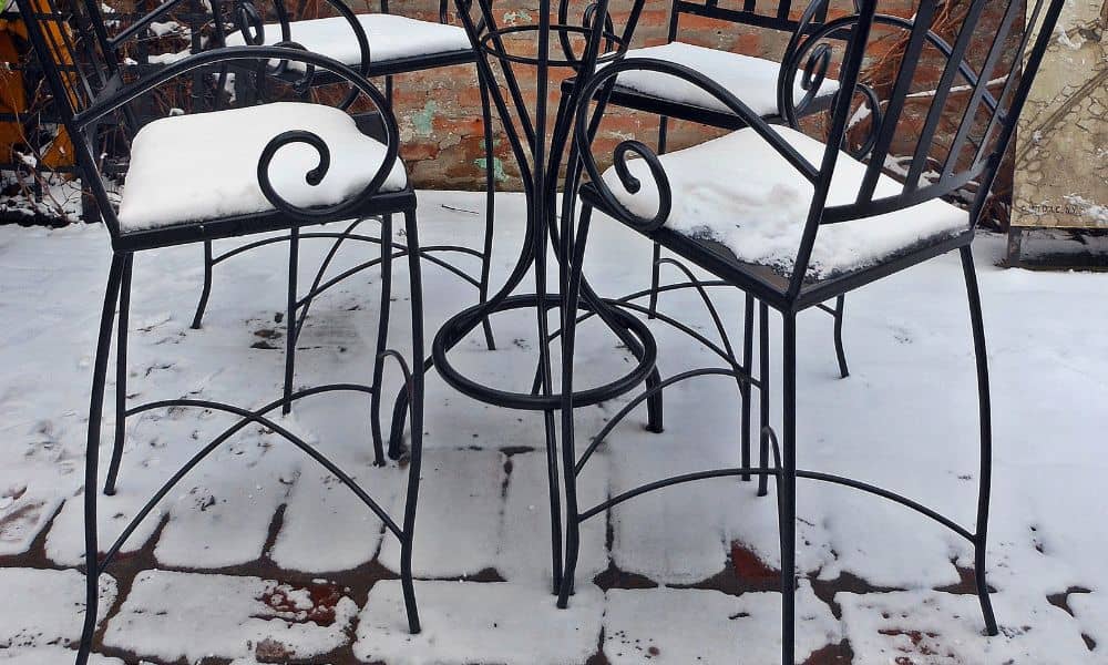Snow-covered brick patio showing effects of winter freeze on outdoor spaces