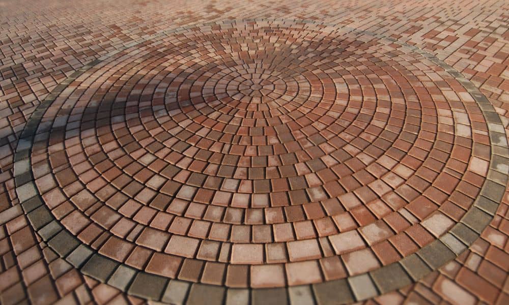 Brick pavers arranged in a circular pattern used for a finished streetscape walkway