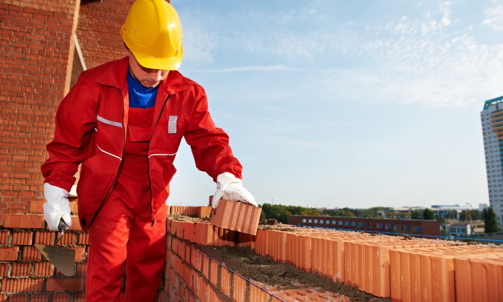 mason repairing residential brickwork in Huntsville AL